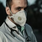 Air Pollution in Dhaka: How to Protect Your Health Person wearing an N95 respirator mask for protection against air pollution in Dhaka, Bangladesh