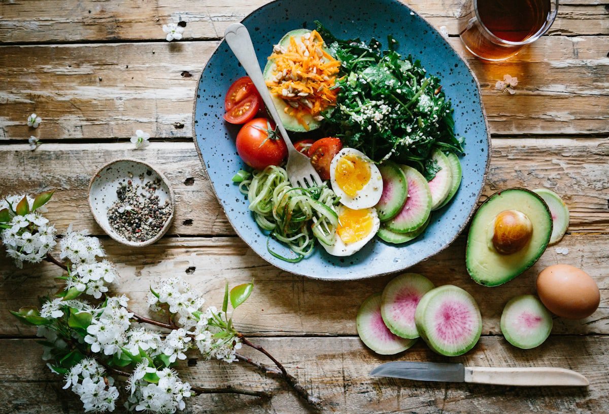High-protein Bangladeshi meal with eggs, fish, vegetables and pulses