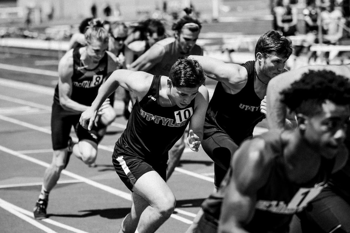 Runners building stamina and endurance on a track